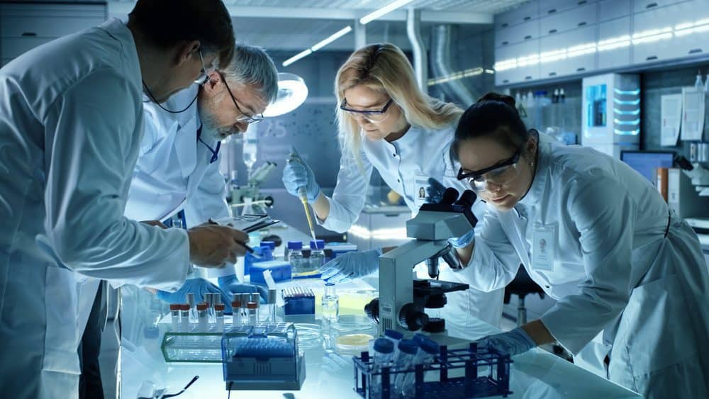 Team,Of,Medical,Research,Scientists,Collectively,Working,On,A,New